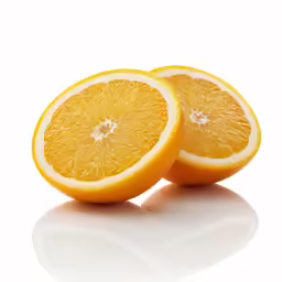 two pieces of oranges sitting side by side on a table
