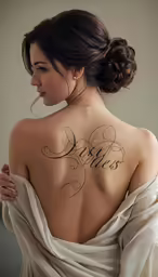 a beautiful young woman with a tattoo on her back