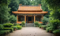 a building surrounded by trees and bushes with trees around it