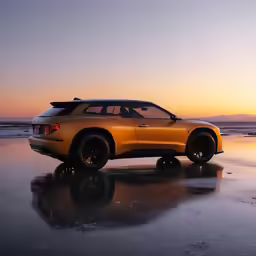 a yellow car sitting on top of the beach