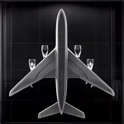 an airplane cut from a piece of glass on a black surface