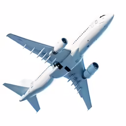 an airplane flying high up in the sky