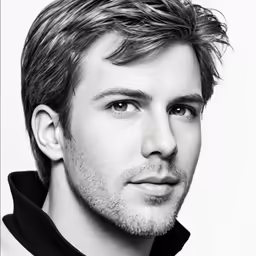 a black and white portrait of a young man