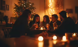 several people sitting around a table drinking wine together