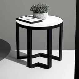 the table is white and black with a small vase of flower