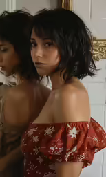 two young girls sitting on top of a toilet in bathroom