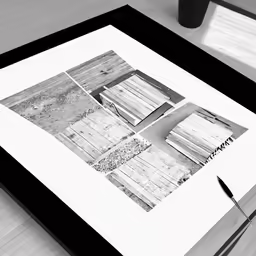 an arrangement of abstractly arranged photos in black and white