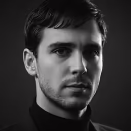 a man is dressed in a shirt and tie