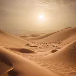 the sun sets in over an area that looks as if it is really sandy
