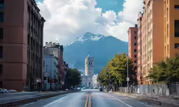 a city street that has a large building near it
