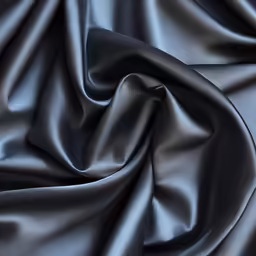 a very dark gray silk material
