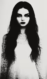 black and white image of a woman with long hair