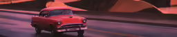 an old red car traveling down the street