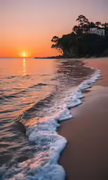 the ocean waves wash up on the beach