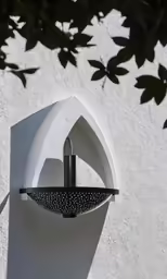 the top portion of a wall with a shower