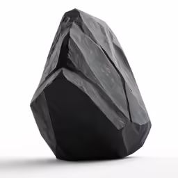 an irregular rock with black pattered coating