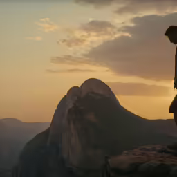 a man standing on top of a rocky mountain