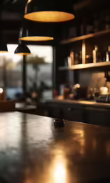 a blurry image of a restaurant with three lamps