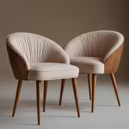 two wooden chairs on gray background