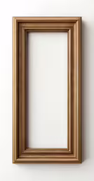 a gold frame against a white wall