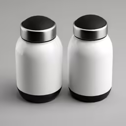 two white containers on top of a table