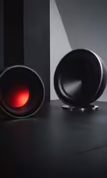 a speaker and speaker box in black, dark colored background