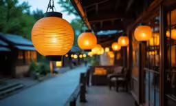 there are four lights hanging from the ceiling