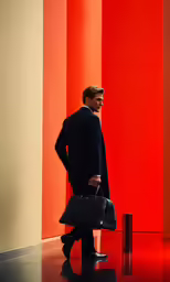 a man in a suit walks down the street while holding a briefcase