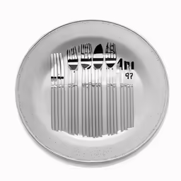 forks on top of each other in a plate
