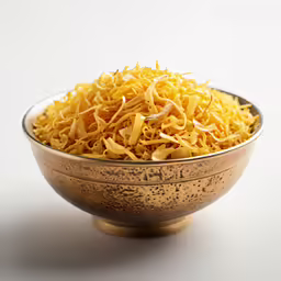 closeup of bowl full of uncooked pasta