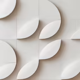 modern white wall with several leaves made up of a paper cutout