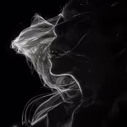 a woman is shown smoking with a cigarette in her mouth