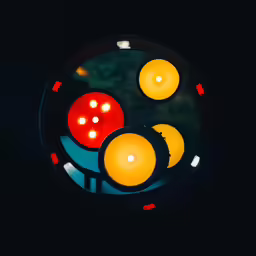 a close - up of two traffic lights sitting in the dark
