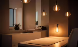 the lights in the bathroom are lit up