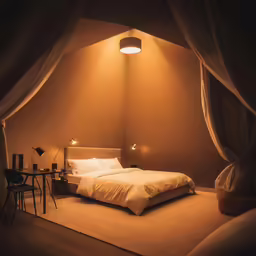 the bed is made up and the pillows are pulled down