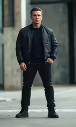 man standing in black clothing and looking off to the side