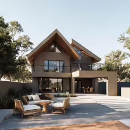 an outdoor living space with a table and chairs
