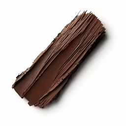 a partially finished chocolate bar laying on a white background