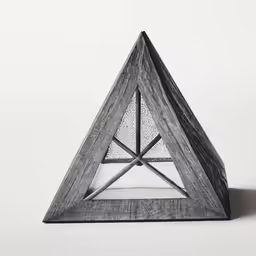 a black and white photo of a triangular object