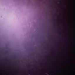 people standing under a purple and black light