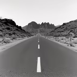 this is an image of the empty road in the desert