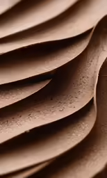 a close up image of a wall with very rough layers