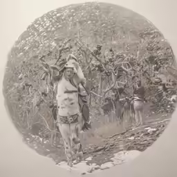 a man walks on the snowy ground in an unusual hat