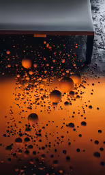 liquid pouring down onto a metal table near a chair