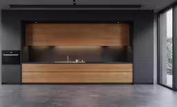 a kitchen is shown with a wood cabinet and counter top
