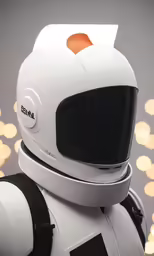 a white and black helmeted robot standing next to some lights