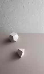 an open air kitchen table with one bowl on it and another bowl in the middle with one small piece of white object