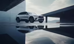 a new mercedes vehicle is parked in the middle of a pool