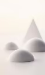 abstract shapes of rounded rocks and white marble