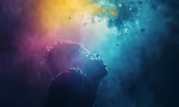 a man that is in the air with his head back and face to the side